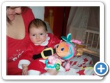 Olivia opening her stocking gifts