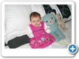 Olivia with her mummy and daddy's childhood teddy